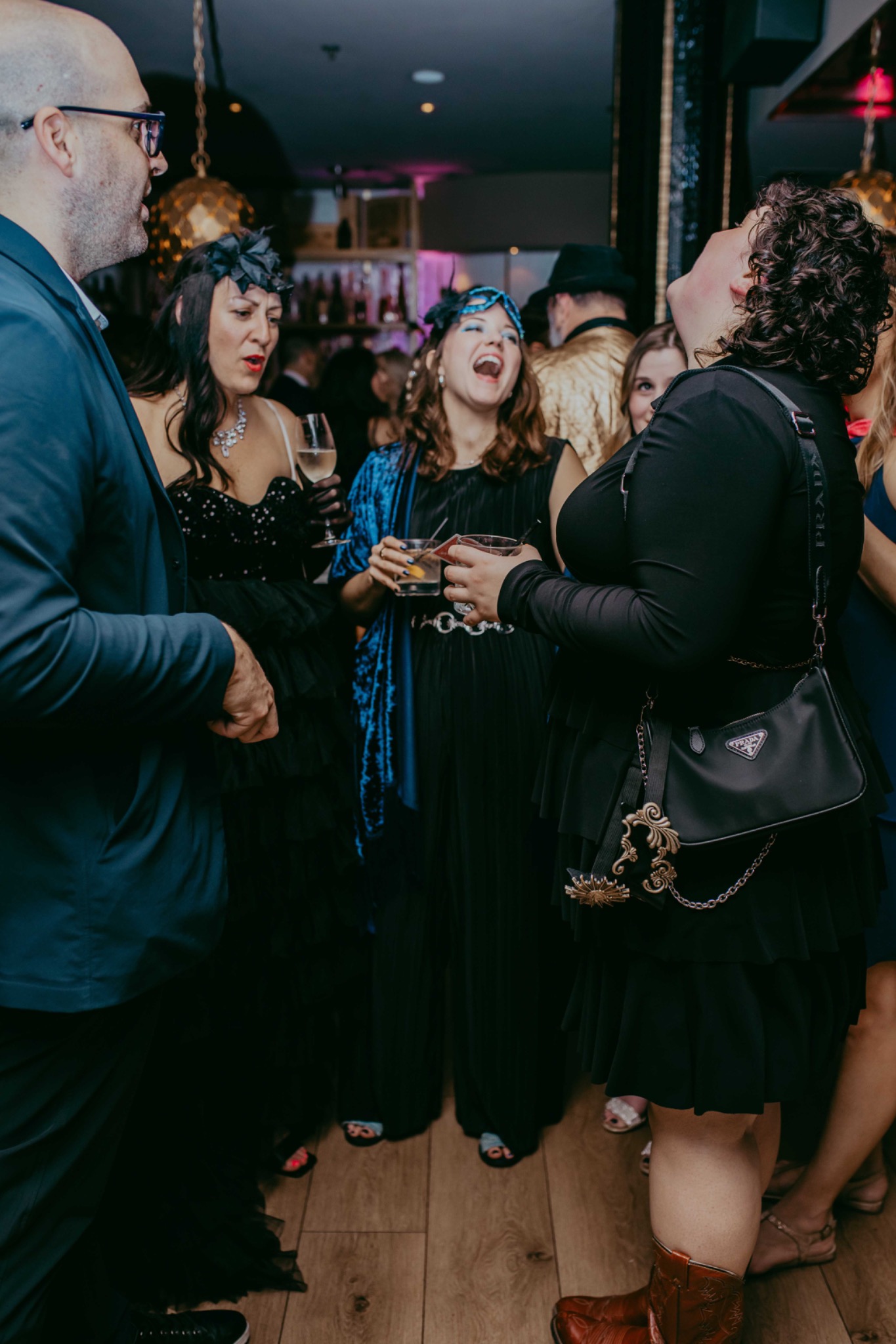 Michael Bourada performing close-up magic for wedding guests